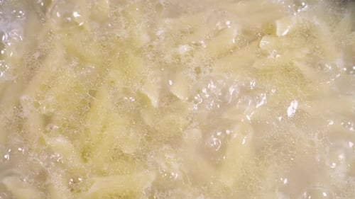 Pasta Cooks in Boiling Water