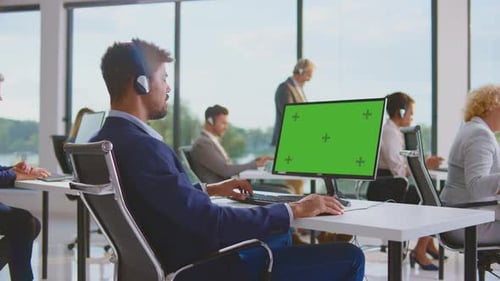 Modern Office Employees Working at Computers