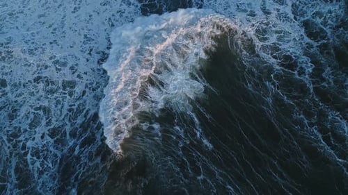 Top View on Big Waves of Atlantic Ocean at Sunset