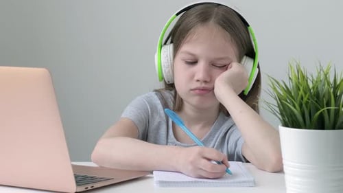 Homeschooling Kid Girl Feeling Bore to Do Homework and Assigned Job From Remote School Teacher