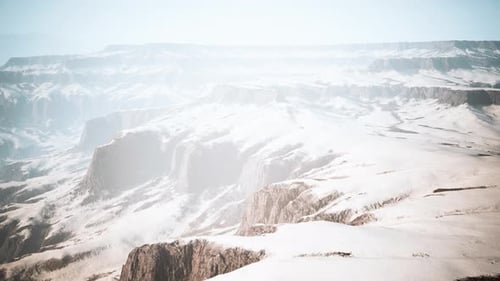 Snowcovered Rocks on a Windy Plateau