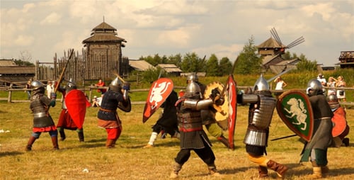 Armoured Men in Battle with Swords and Shields
