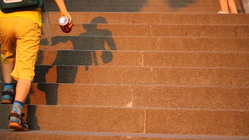 Children Ascending Stairs in the Golden Hour