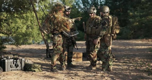 Gathering of Soldiers at Base Group of Territorial Defense Men Setting Tactics Plan of Action