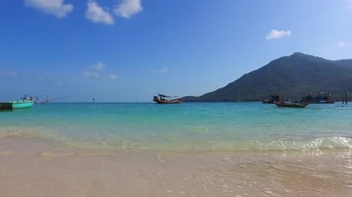 Aerial top view seascape of beautiful tourist beach vacation by blue lagoon and white sand backgroun