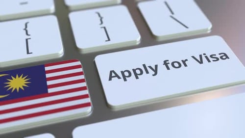 Malaysia Visa Application Button Pressed on Keyboard