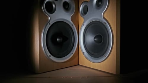 Audio Speakers Vibrate From Sound Bass in Slow Motion on Black Background