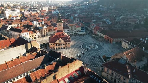 Aerial drone view of The Council Square in Brasov, Romania. Old city centre with County Museum of Hi