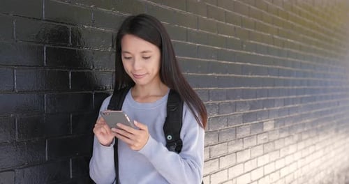 Woman use of smart phone at outdoor