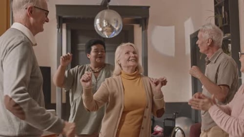 Joyful Seniors Dancing in Nursing Home