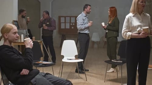 Corporate Professionals Networking During Coffee Break