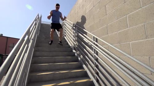 Man Descending Stairs During Fitness Workout