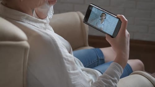 Woman Having Telemedicine Appointment on Smartphone