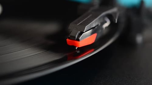 Turntable Needle Playing Vinyl Record Close Up