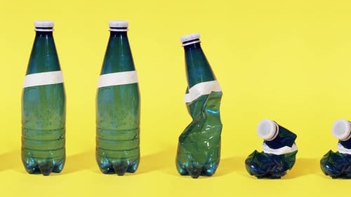 Plastic Bottles Crushing Time Lapse on Yellow