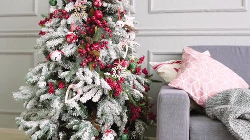 Decorated Christmas Tree with Grey Sofa