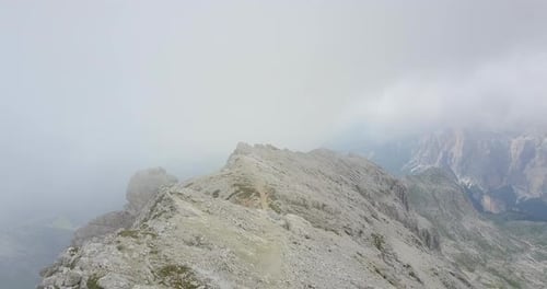 Aerial drone view of fog and foggy landscapes in the mountains.