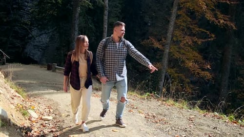 Weekend Trip in Forest of Young Couple Man and Woman at Nature
