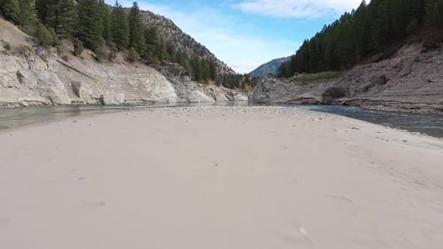 Flying low over sandbar in the Snake River in Jackson Canyon