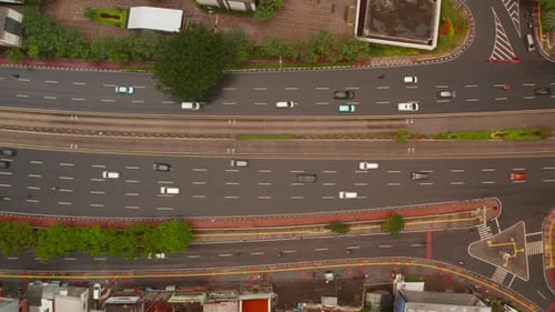 Top Down Overhead Aerial Truck View Following Cars and Motorcycles on a Multi Lane Highway in Asia