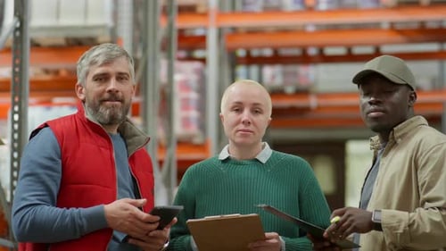 Group Portrait of Diverse Warehouse Workers