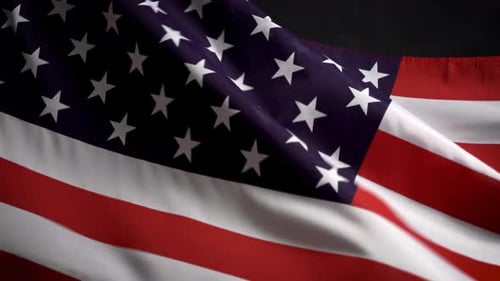 American Flag Waving Symbolically in Studio Lighting