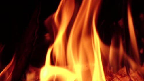 Fireplace Burning. Warm Cozy Fire in Fireplace, Closeup. Slow Motion