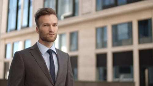 Young Man in Suit in an Urban Setting