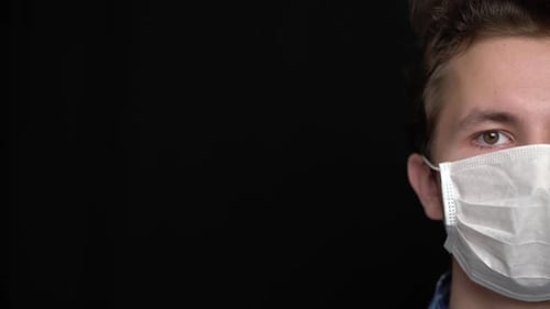 Boy Feeling Sick and Wearing Mask