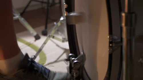 The Leg of a Drummer in a Rock Band on a Double Pedal