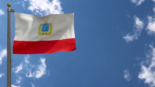 Realistic Flag Waving Animation with Emblem Against Blue Sky