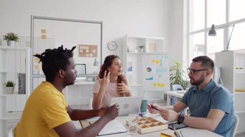 Team Meeting in Modern Bright Office Setting