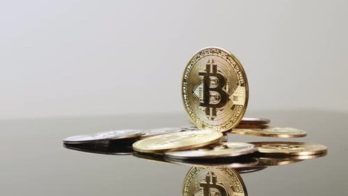 Golden Bitcoin Standing Among Cryptocurrency Coins