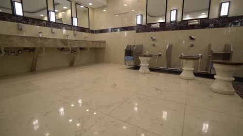 Brightly Lit Ablution Hall with Marble Features