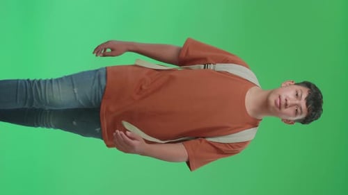 The Front View Of Asian Boy Student Walking To School On Green Screen