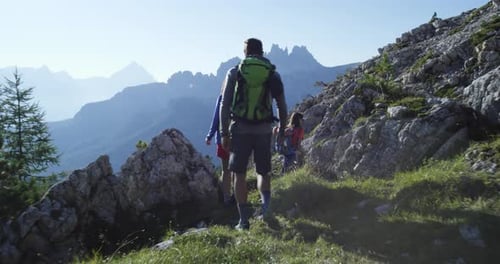 Four Friends Walking Along Hiking Trail Path