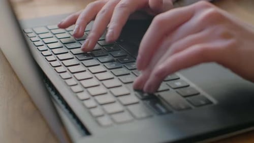 Woman Typing on Laptop Keyboard in the Office, Close Up Woman Hands Writing on Laptop Computer