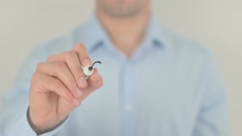 Hand Writes the Word Change on Clear Surface