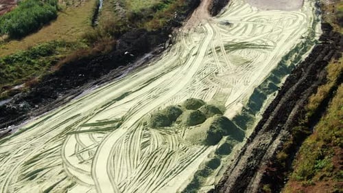 Fresh Soil Aerial View with Tire Tracks