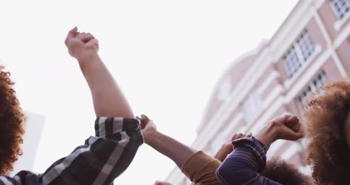 People Raise Fists in City Protest