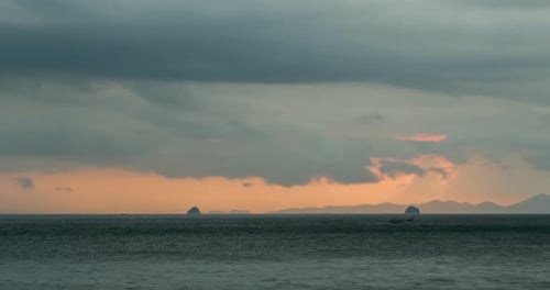 Timelapse of Light Rays Over the Sea or Ocean at Sunset