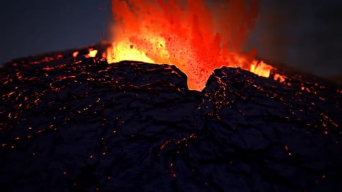 Active volcano eruption. Volcanic crater throws away glowy orange fireballs