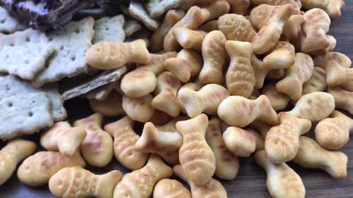 Heap of Fish Shaped Crackers and Snacks