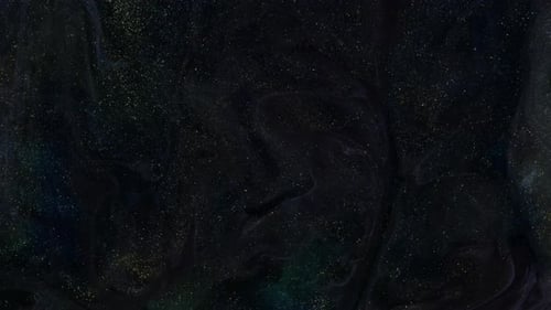 Belles particules dorées scintillantes avec reflet de lentille sur fond noir au Ralenti