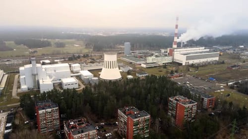 Aerial View of Power Plant and Cityscape