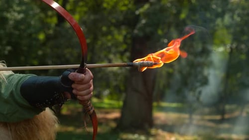 Flaming arrow release, ultra slow motion
