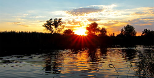 Golden Sunset Reflected Over the Calm Water