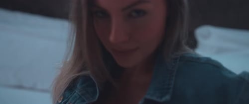 Fashionable Woman in Denim Jacket Close-Up
