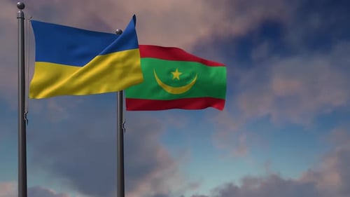 National Flags of Ukraine and Mauritania Waving Against a Cloudy Sky
