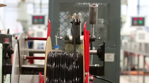 Industrial Production - Production of Black Rubber Gaskets - Winding on a Roll